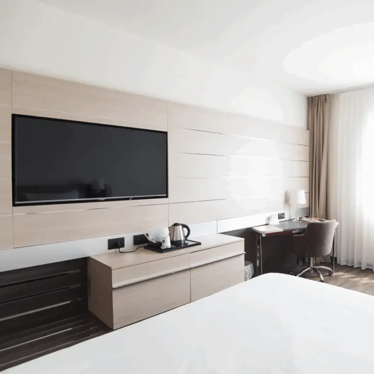 tv mounted well in a modern hotel room