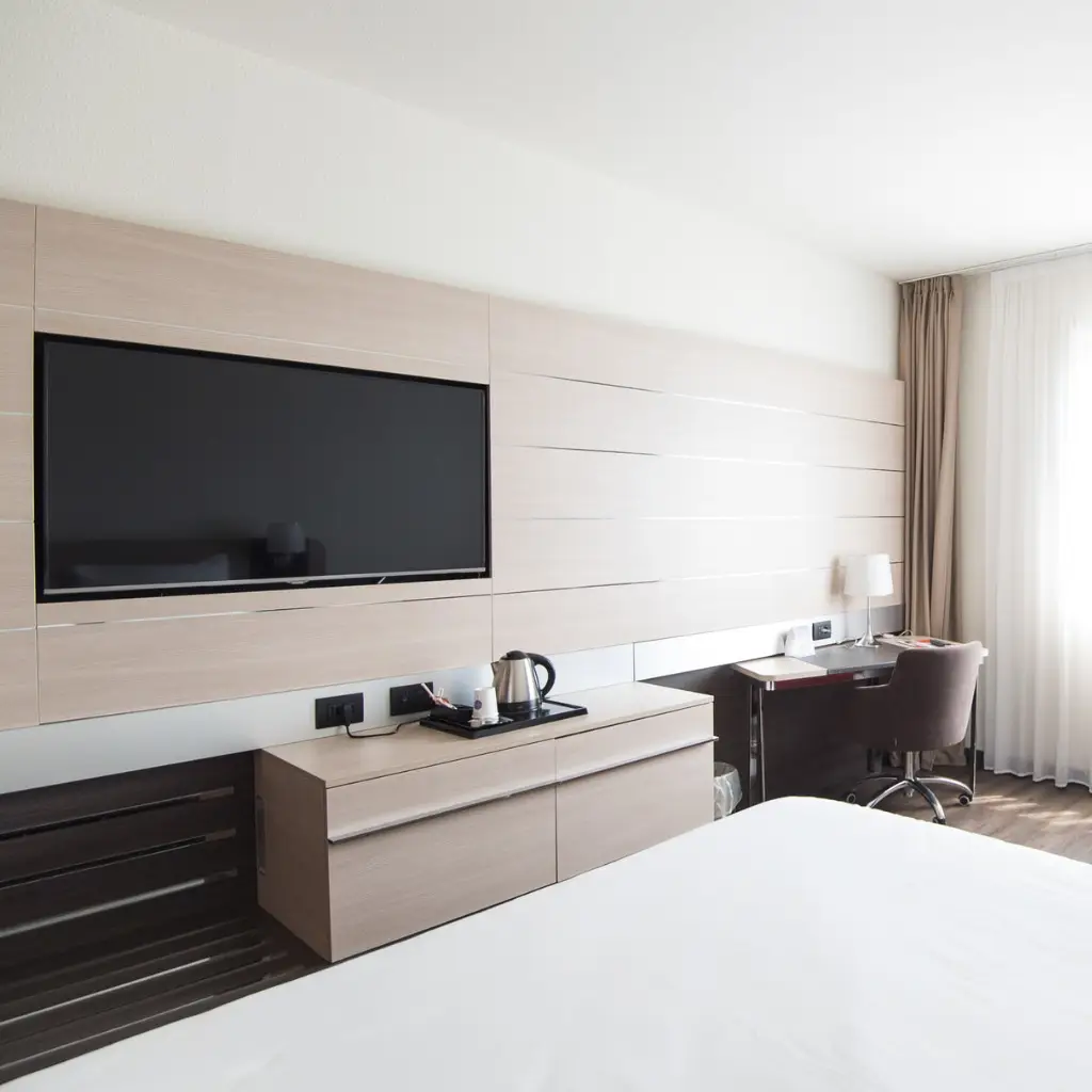tv mounted well in a modern hotel room