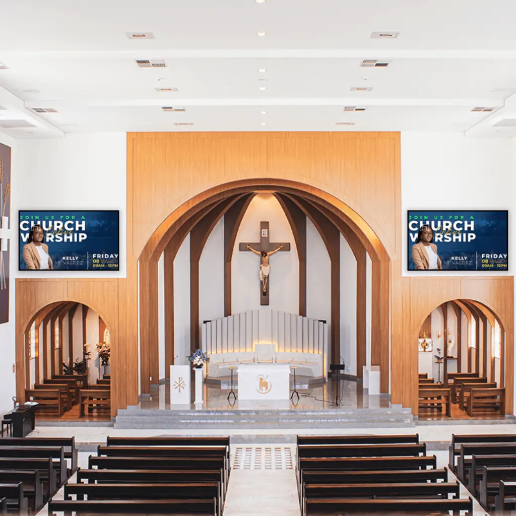 tvs mounted in a church. Once on each side of the alter.