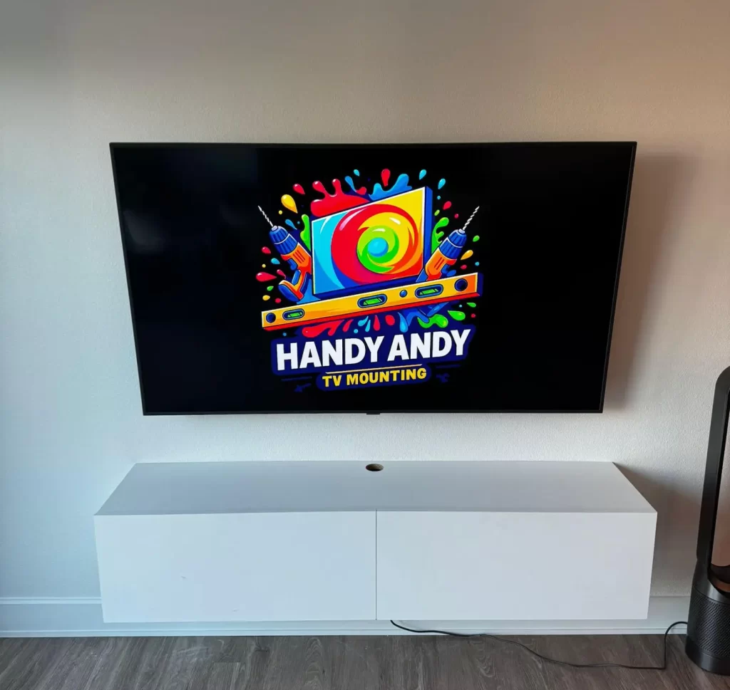 tv mounted over a white cabinet in los angeles