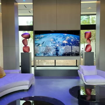 Commercial TV Mounted in a home with art on both sides