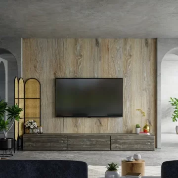 TV mounted on wood paneling wall.